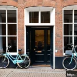 Home 18 광고홍보사 채용 시장 트렌드 - A modern Dutch creative advertising agency office scene showing a diverse team of professionals enga...